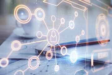 Poster - Computer on desktop with social network hologram. Double exposure. Concept of international people connections.