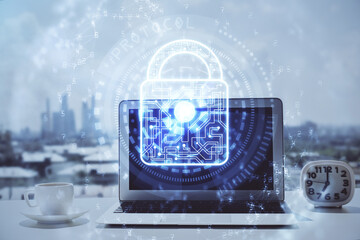 Poster - Double exposure of desktop with computer and lock icon hologram. Concept of data safety.