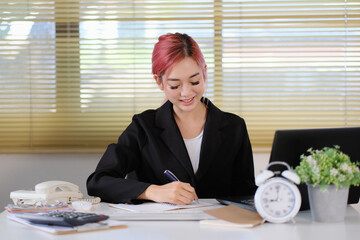 Poster - Woman accountant using calculator and computer in office panoramic banner, finance and accounting concept