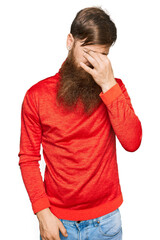 Sticker - Redhead man with long beard wearing casual clothes tired rubbing nose and eyes feeling fatigue and headache. stress and frustration concept.