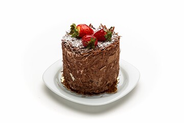 Poster - Small delicious chocolate cake with strawberries on white plate isolated on white background