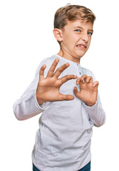 Little caucasian boy kid wearing casual clothes disgusted expression, displeased and fearful doing disgust face because aversion reaction. with hands raised