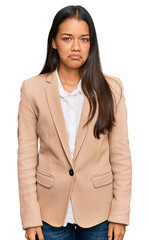 Sticker - Beautiful hispanic woman wearing business jacket depressed and worry for distress, crying angry and afraid. sad expression.