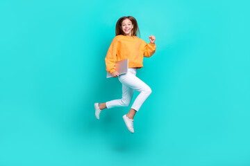 Sticker - Full length photo of hurrying pretty school girl dressed orange hoodie holding modern gadget running fast isolated teal color background