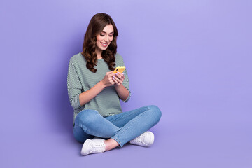 Canvas Print - Photo of lovely cute lady sitting chatting instagrm facebook twitter followers post repost empty space isolated on purple color background