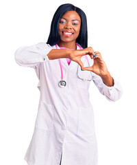 Poster - Young african american woman wearing doctor stethoscope smiling in love doing heart symbol shape with hands. romantic concept.