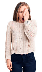 Wall Mural - Young beautiful blonde woman wearing casual sweater yawning tired covering half face, eye and mouth with hand. face hurts in pain.