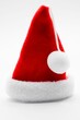 Vertical shot of a Christmas Santa Claus Hat isolated on a white background