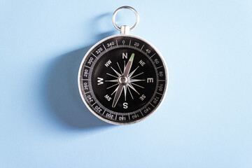 compass on blue background