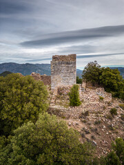 Wall Mural - Aerial view of the ruins of Castellu di Seravalle, a military fortress built in the 11th century on a hilltop near the village of Popolasca in Corsica