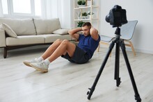 Man Athlete Blogger Records Exercise Training On The Body At Home On Camera, Sports Blogger Bodybuilder, The Concept Of Health And Beauty