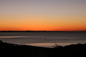 Sticker - Morning glow silhouette at sunrise. Natural background material.