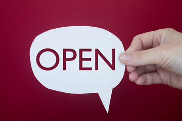 Poster - Speech bubble in front of colored background with Open text.