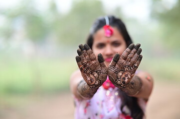 Wall Mural - Henna on hands. Indian bride Mehendi Ceremony. Henna art tattoo wedding design