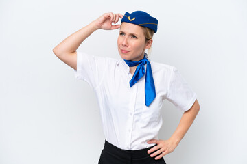 Wall Mural - Airplane blonde stewardess woman isolated on white background having doubts and with confuse face expression