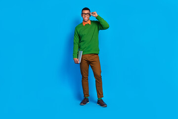 Sticker - Full body size photo of successful programmer it company owner hold his apple macbook working remote touch glasses isolated on blue color background