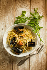 Poster - pasta with mussels garlic and parsley, traditional italian recipe