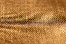 Macro Of Golden Color Fabric In Horizontal Orientation