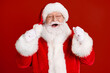 © deagreez - Photo of delighted santa claus raise fists enjoy x-mas newyear holly magic miracle lottery win raise fists wear red cap headwear isolated over bright shine color background