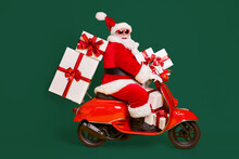 Full Size Profile Side Photo Of White Grey Hair Bearded Santa Claus Ride Motorbike Deliver X-mas Christmas Gifts On Noel Night Wear Headwear Isolated Bright Shine Color Background