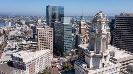 Wall Mural - Afternoon skyline aerial view of the urban core of downtown Oakland, California, USA.