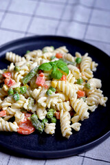 Wall Mural - Pasta Salad with vegetables with sauce and spices.