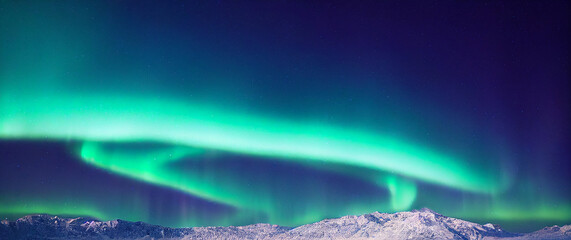 Wall Mural - northern lights over lake. aurora borealis with starry in the night sky. fantastic winter epic magic