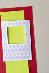 Canvas Print - retro paper card with neon yellow, red, and beige paper background