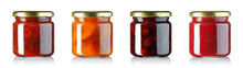 Set Of Jam In Small Glass Jars With Metallic Lids Isolated On White