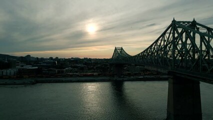 Poster - Aerial view of a suspended bridge on a gloomy day