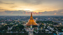 A Massive Golden Pagoda Located In The Sunset Community Of Phra Pathom Chedi, Nakhon Pathom, Thailand