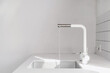 modern sink and water flowing from faucet at kitchen