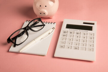 Wall Mural - Notepad, calculator and piggy bank