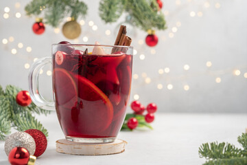 Wall Mural - Christmas mulled red wine with spices and fruits. Traditional hot drink at Christmas time