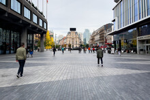 Pedestrians Walking In A Public Square In Brussels