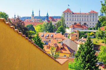 Wall Mural - Summer cityscape - view of the Hradcany historical district of Prague with building of the Ministry of Foreign Affairs of the Czech Republic, Prague, Czech Republic