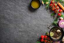 Culinary Concept. Dark Cooking Food Background Vegetables And Spices On The Kitchen Table With Copy Space Top View