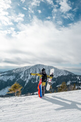 Canvas Print - man snowboarder with slovakia flag at ski resort slope