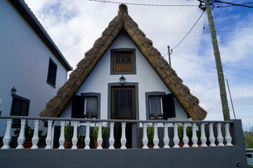 Poster - Santana, Madeira Portugal, circa october 2022: traditional triangular houses