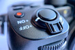 Close-up of the cameras shutter lever, iso sensitivity selection buttons, quick menu and video recording mode