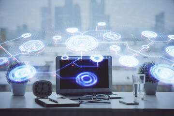 Poster - Computer on desktop with social network hologram. Double exposure. Concept of international people connections.