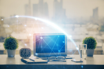 Poster - Computer on desktop with social network hologram. Double exposure. Concept of international people connections.