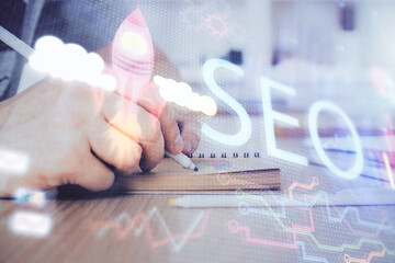 Poster - Man writing. With double exposure seo drawings.