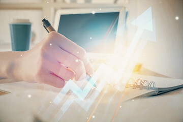 Poster - Blue arrow over woman's hands taking notes background. Concept of success. Double exposure