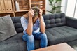 © Krakenimages.com - Young blonde woman patient having psychology session at clinic