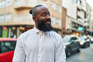 Poster - Young african american man smiling confident standing at street