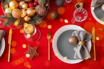 Stylish table setting for Christmas dinner, top view