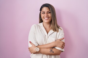 Poster - blonde woman standing over pink background happy face smiling with crossed arms looking at the camer