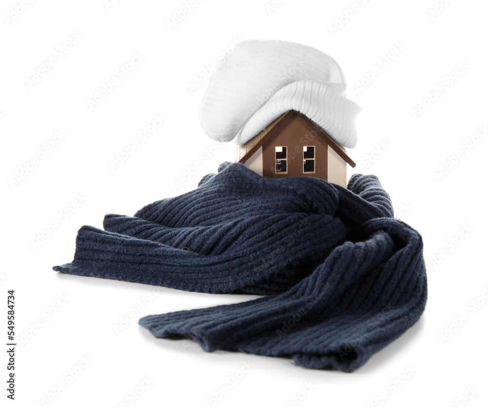 House model with hat and scarf on white background. Heating concept
