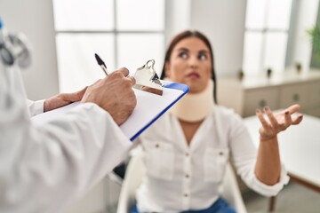 Sticker - Man and woman doctor and patient having medical consultation for accident at clinic